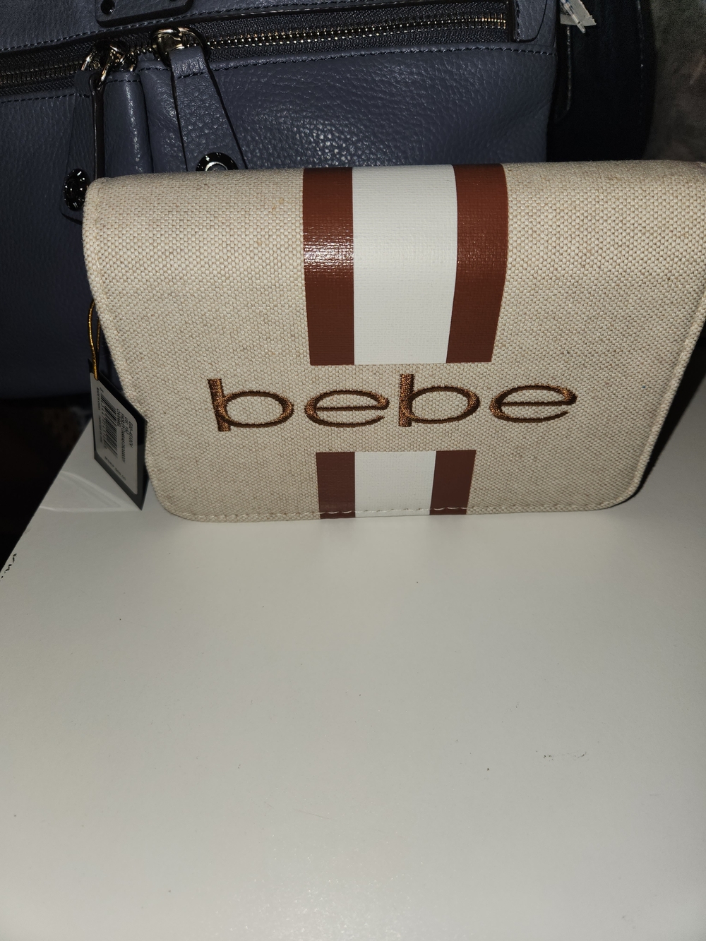 bebe Cream Canvas Crossbody with Brown Stripe and Embroidered Logo